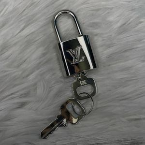 Louis Vuitton Silver Lock & Keys #315